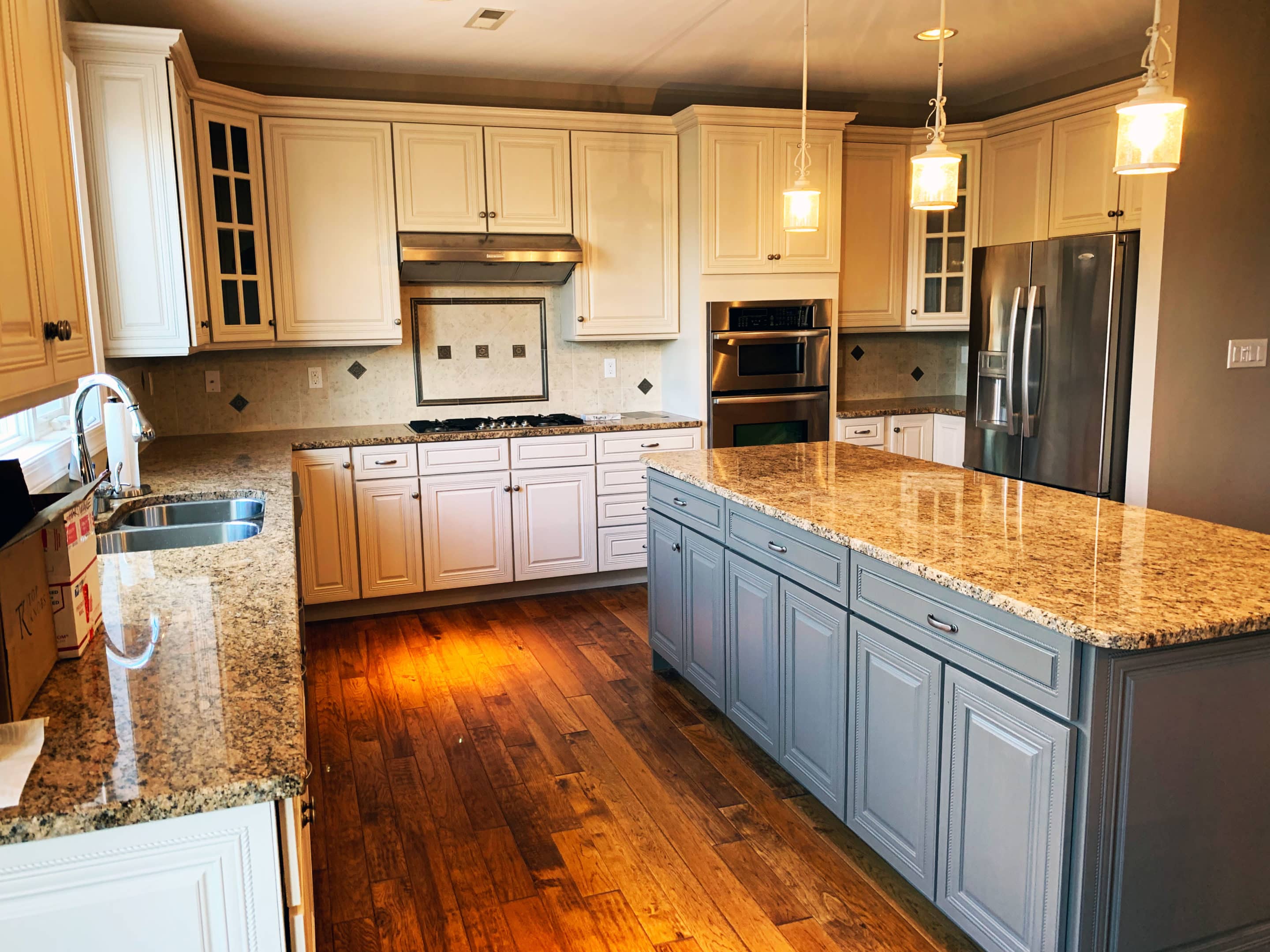 Maple Kitchen Cabinets Refinished to White with Organic Grey Island
