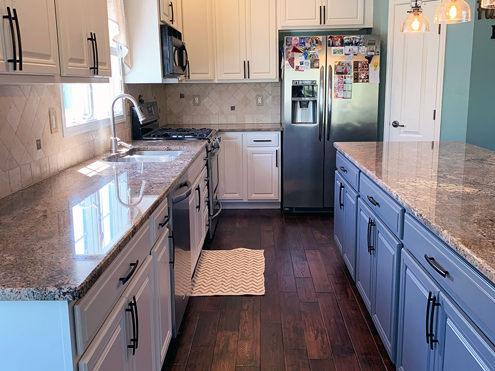 Maple Kitchen Cabinets Refinished to French Vanilla with Charcoal Island